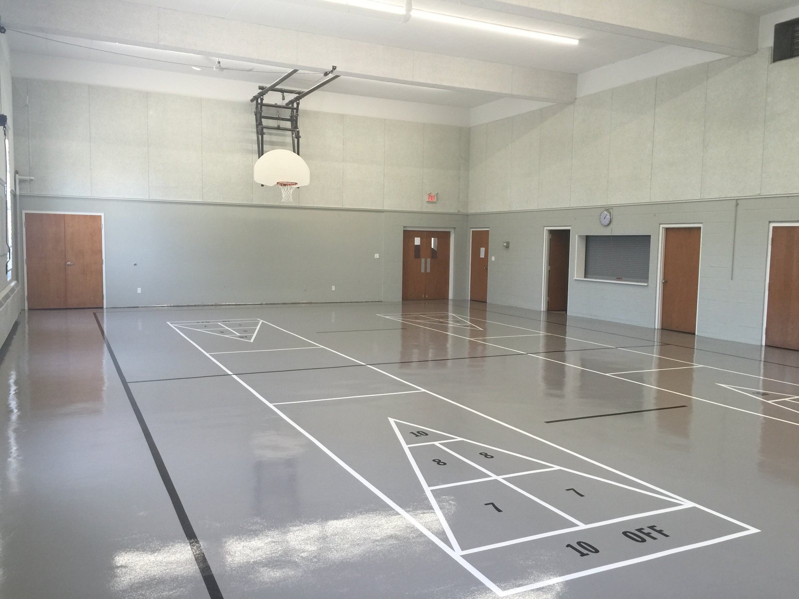 Gym epoxy floor coating with shuffle board design