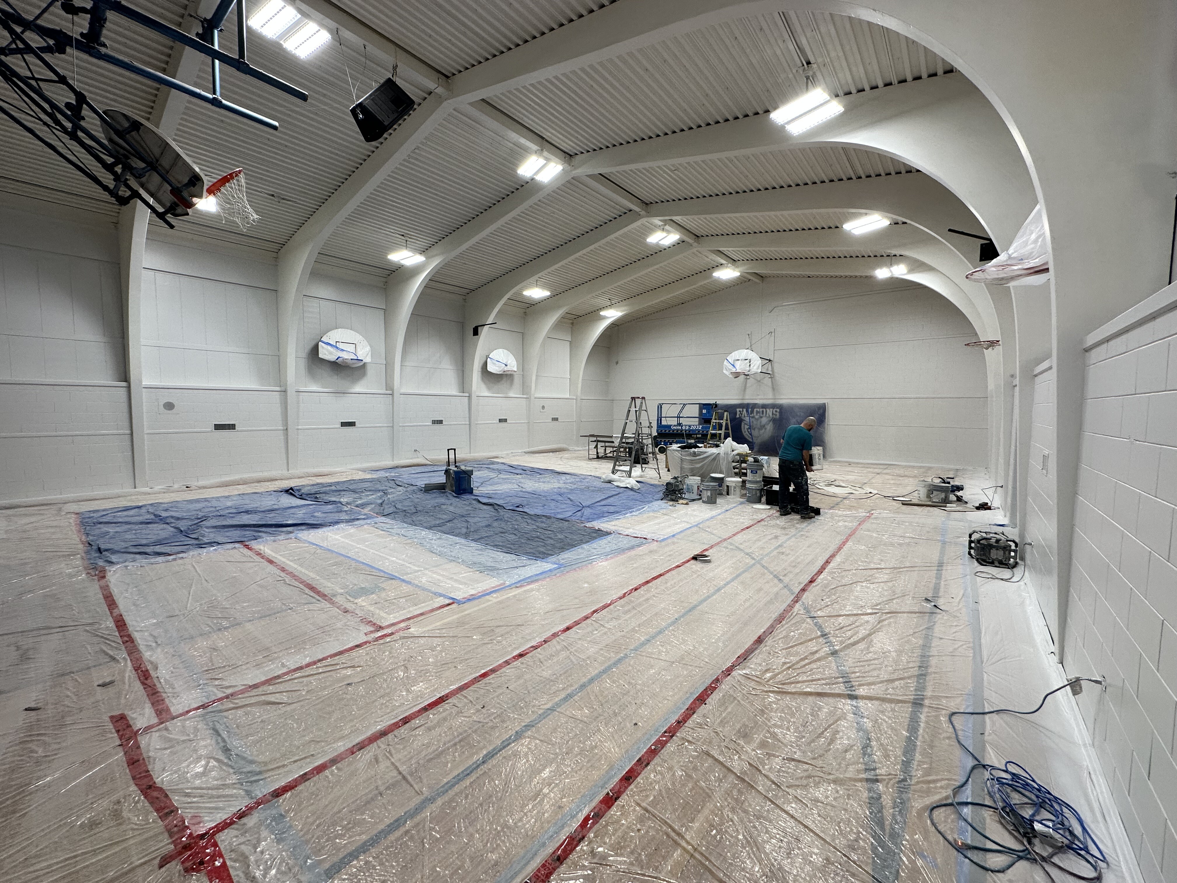  Gym walls and beams during painting project